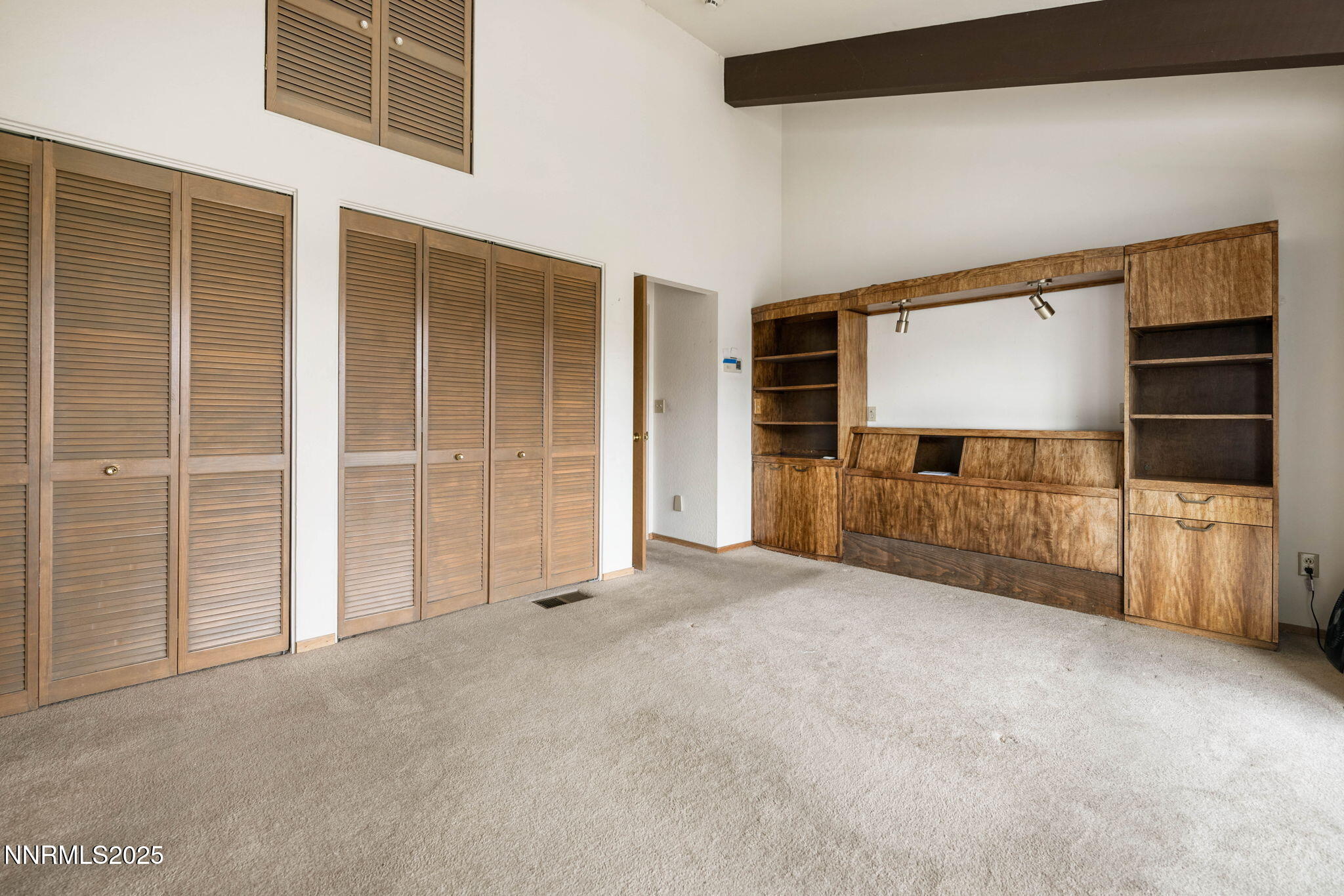 77 Ophir Mill Road Dayton, NV 89403 - Photo 43 of 44 a view of an empty room with cabinet and mirrors