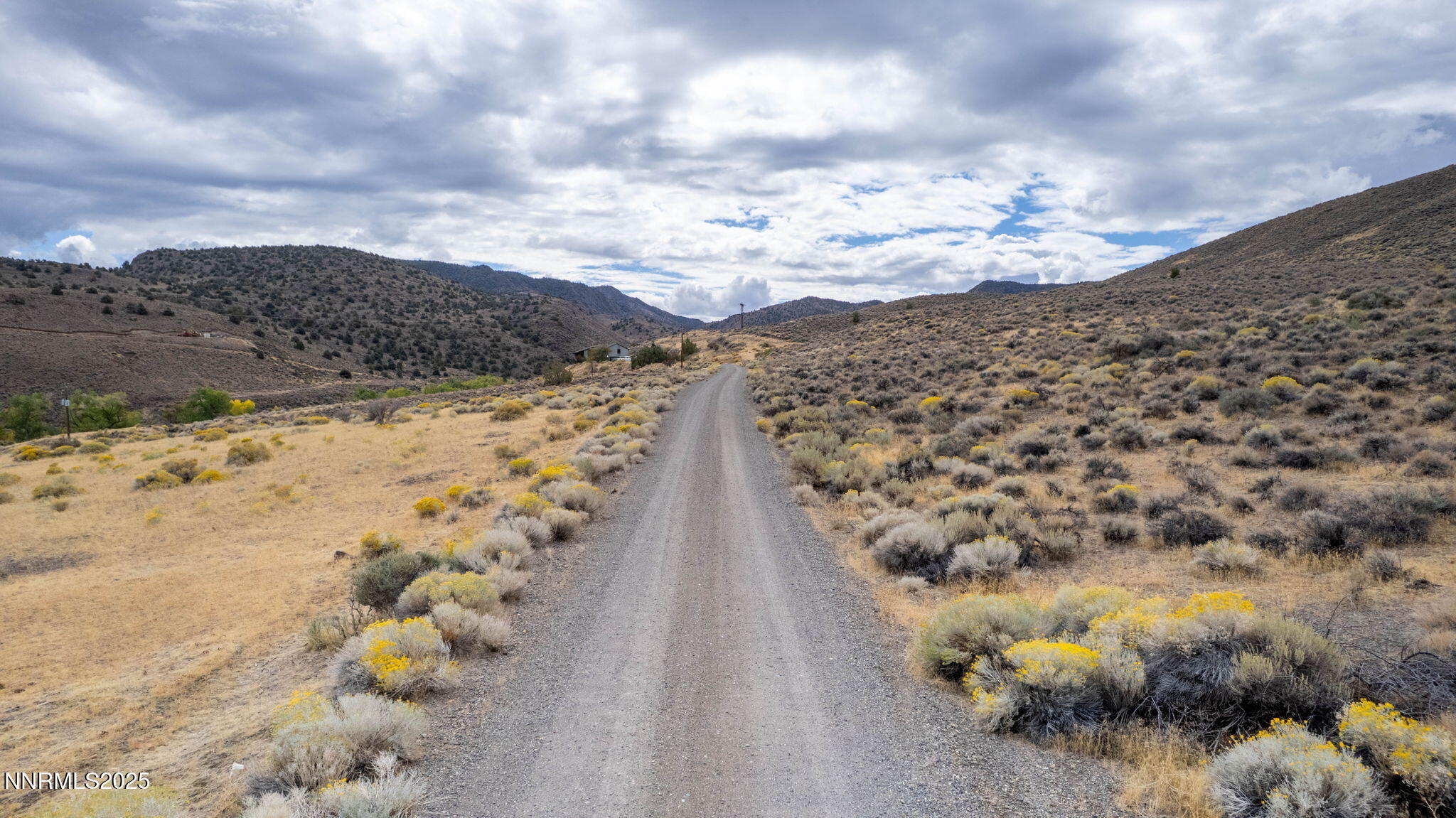 77 Ophir Mill Road Dayton, NV 89403 - Photo 6 of 44 a view of a sky from a yard