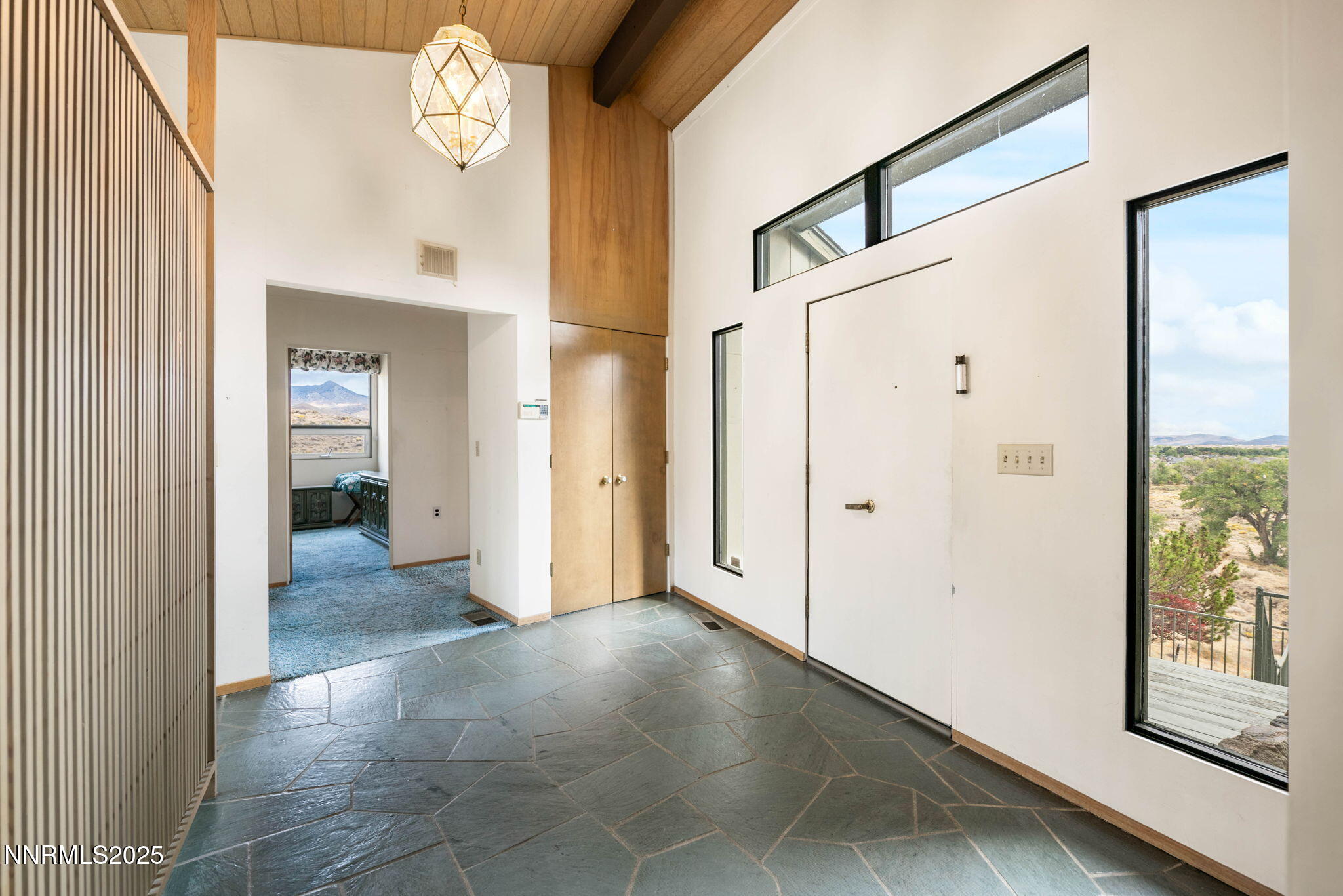 77 Ophir Mill Road Dayton, NV 89403 - Photo 9 of 44 a view of a hallway with a elevator