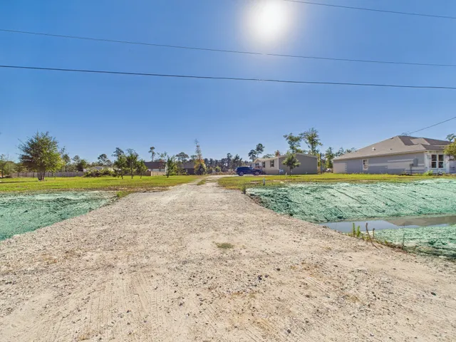 a view of a building with yard