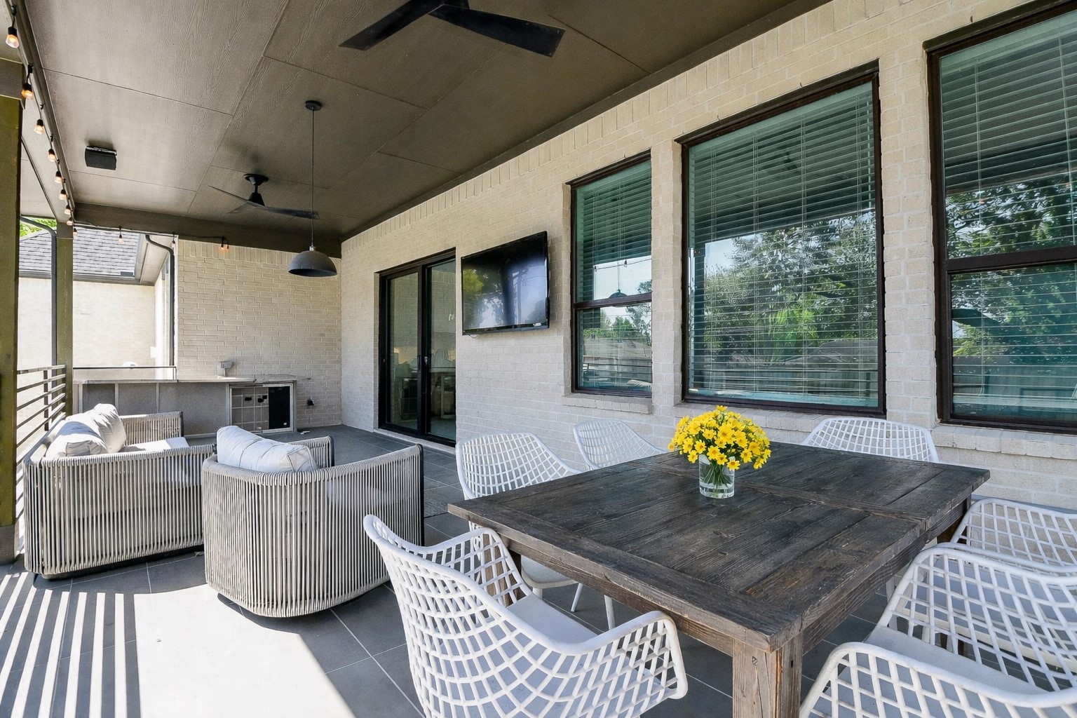5315 Jason Street Houston, TX 77096 - Photo 12 of 39 Enjoy al fresco dining in this tranquil outdoor setting, designed for relaxed and effortless entertaining.