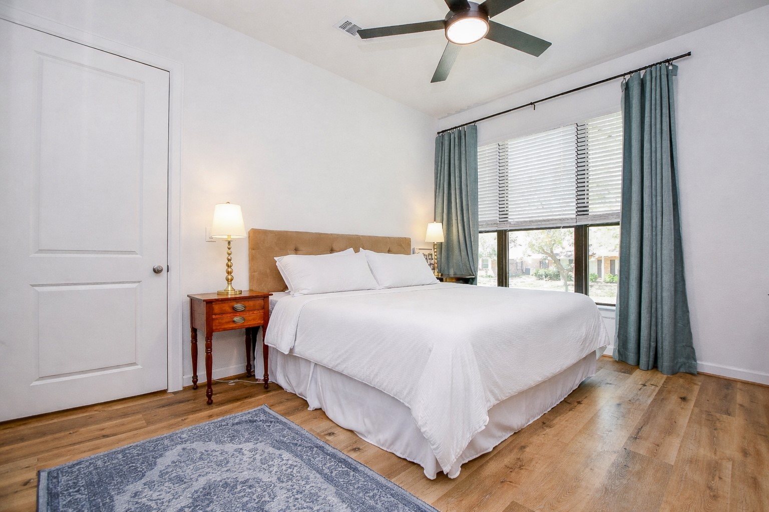 5315 Jason Street Houston, TX 77096 - Photo 16 of 39 First floor ensuite guest room, ideal for visiting parents or those seeking generational living arrangements, offers comfort and privacy. This versatile space provides a convenient and accessible option for accommodating guests or family members, enhancing the overall functionality and appeal of the home.