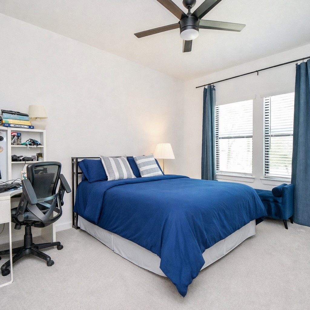 5315 Jason Street Houston, TX 77096 - Photo 23 of 39 Secondary bedroom featuring ample natural light through the windows and a spacious closet for storage.