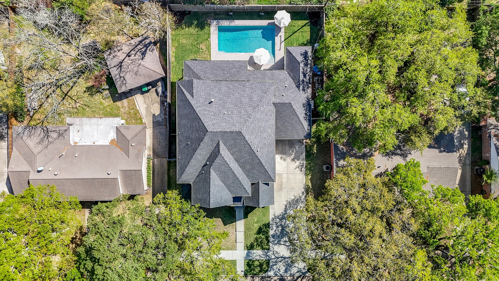 5315 Jason Street Houston, TX 77096 - Photo 35 of 39 Stunning aerial view of the home showcases mature trees surrounding the property, offering ample green space both in the front and back.