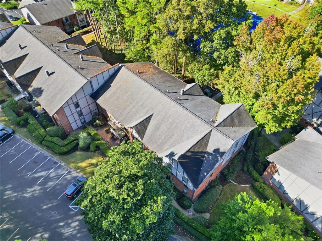 6851 Roswell Road, Unit H29 Atlanta, GA 30328 - Photo 42 of 50 an aerial view of a house with a yard basket ball court and outdoor seating