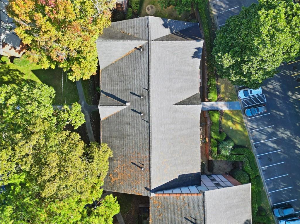 6851 Roswell Road, Unit H29 Atlanta, GA 30328 - Photo 43 of 50 an aerial view of a house with a yard