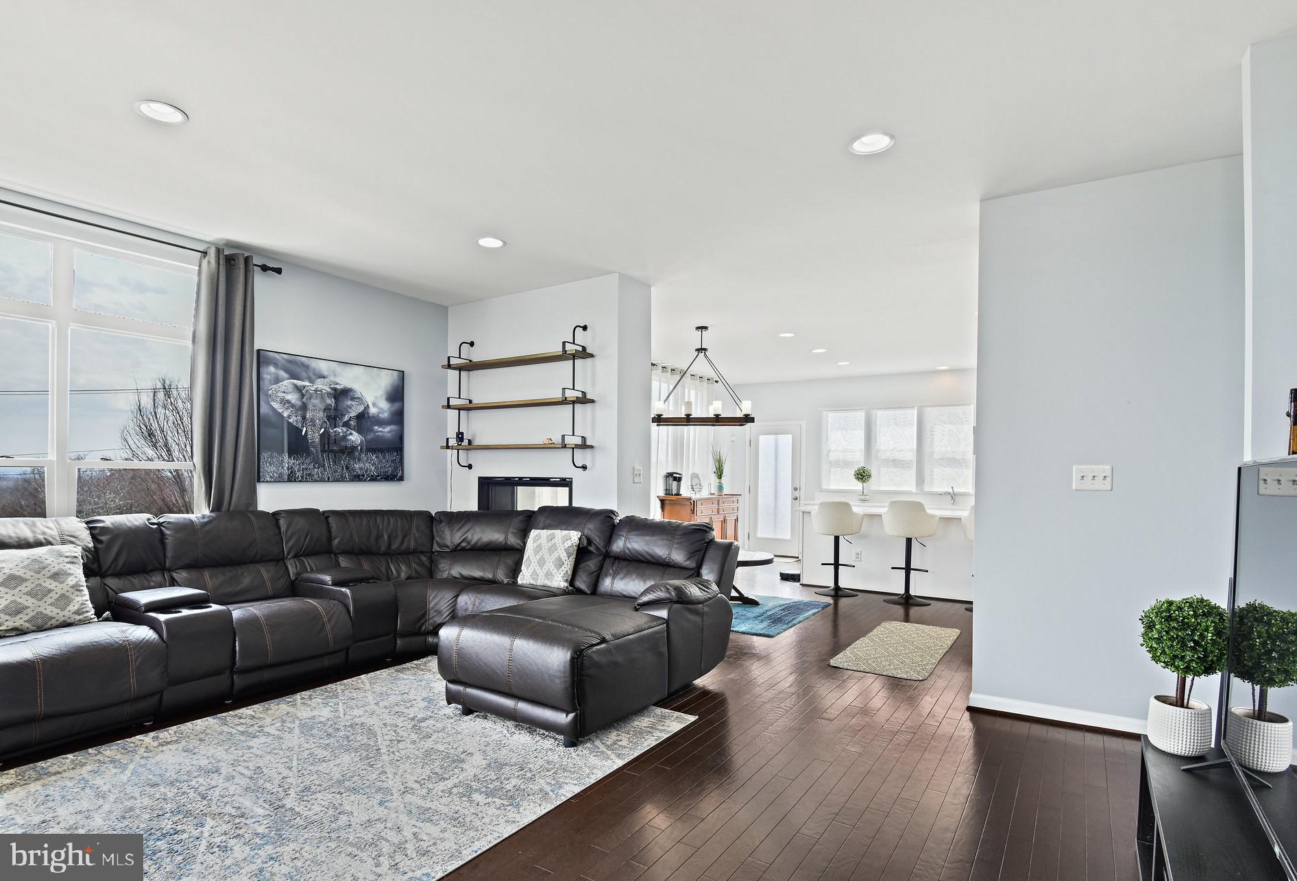 42657 Aden Terrace Ashburn, VA 20148 - Photo 9 of 37 Living Room with Balcony Access