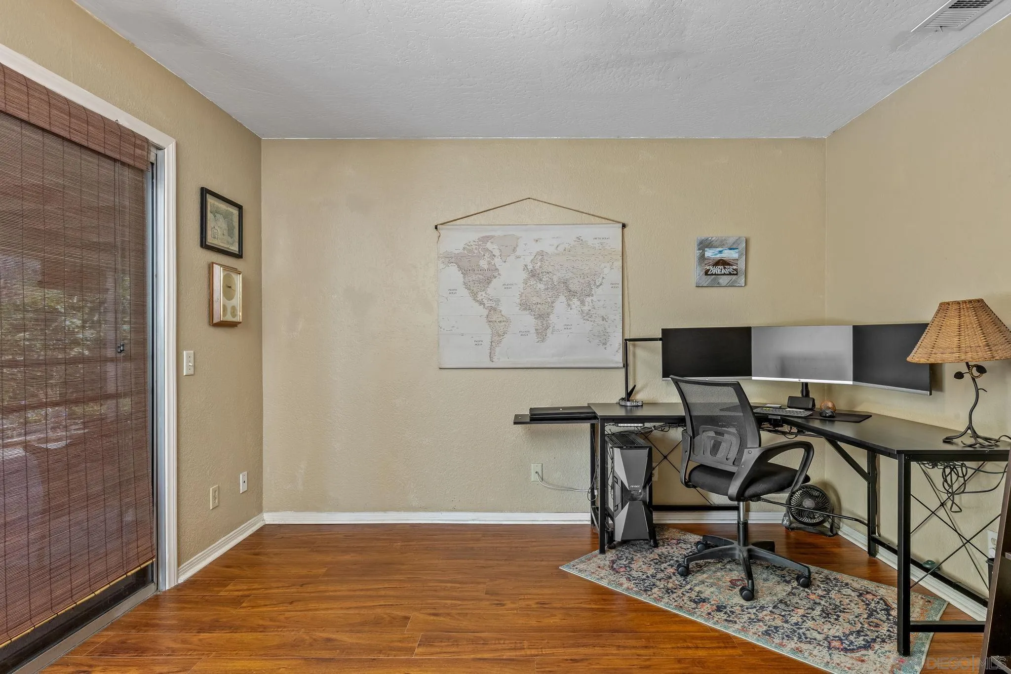 244 Avalon Drive Vista, CA 92084 - Photo 12 of 23 a workspace with furniture and lamp