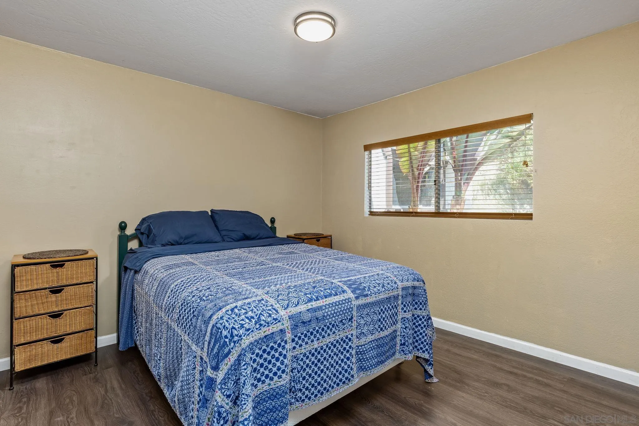 244 Avalon Drive Vista, CA 92084 - Photo 13 of 23 a bedroom with a bed and a window