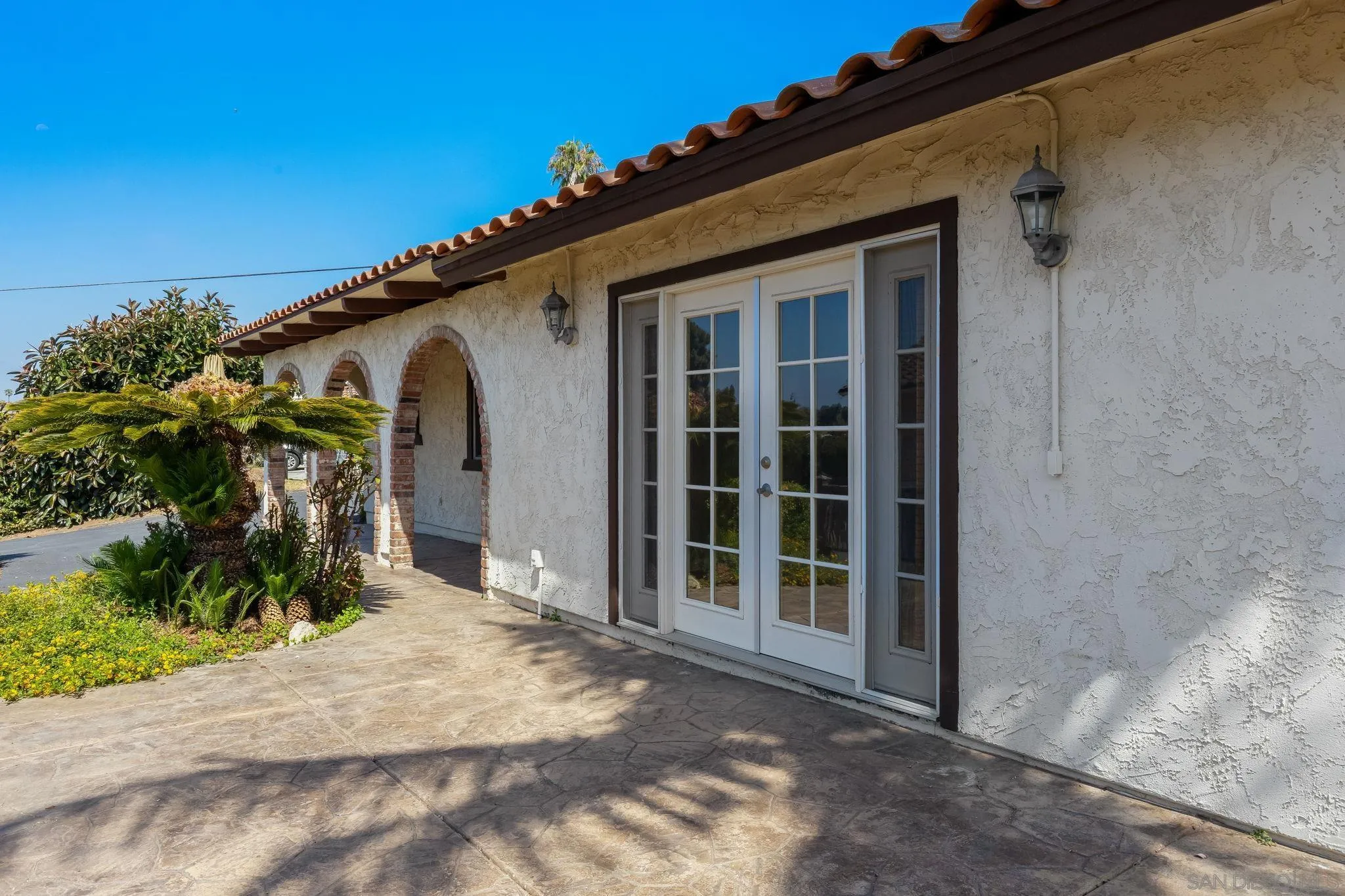 244 Avalon Drive Vista, CA 92084 - Photo 19 of 23 a front view of a house with a yard