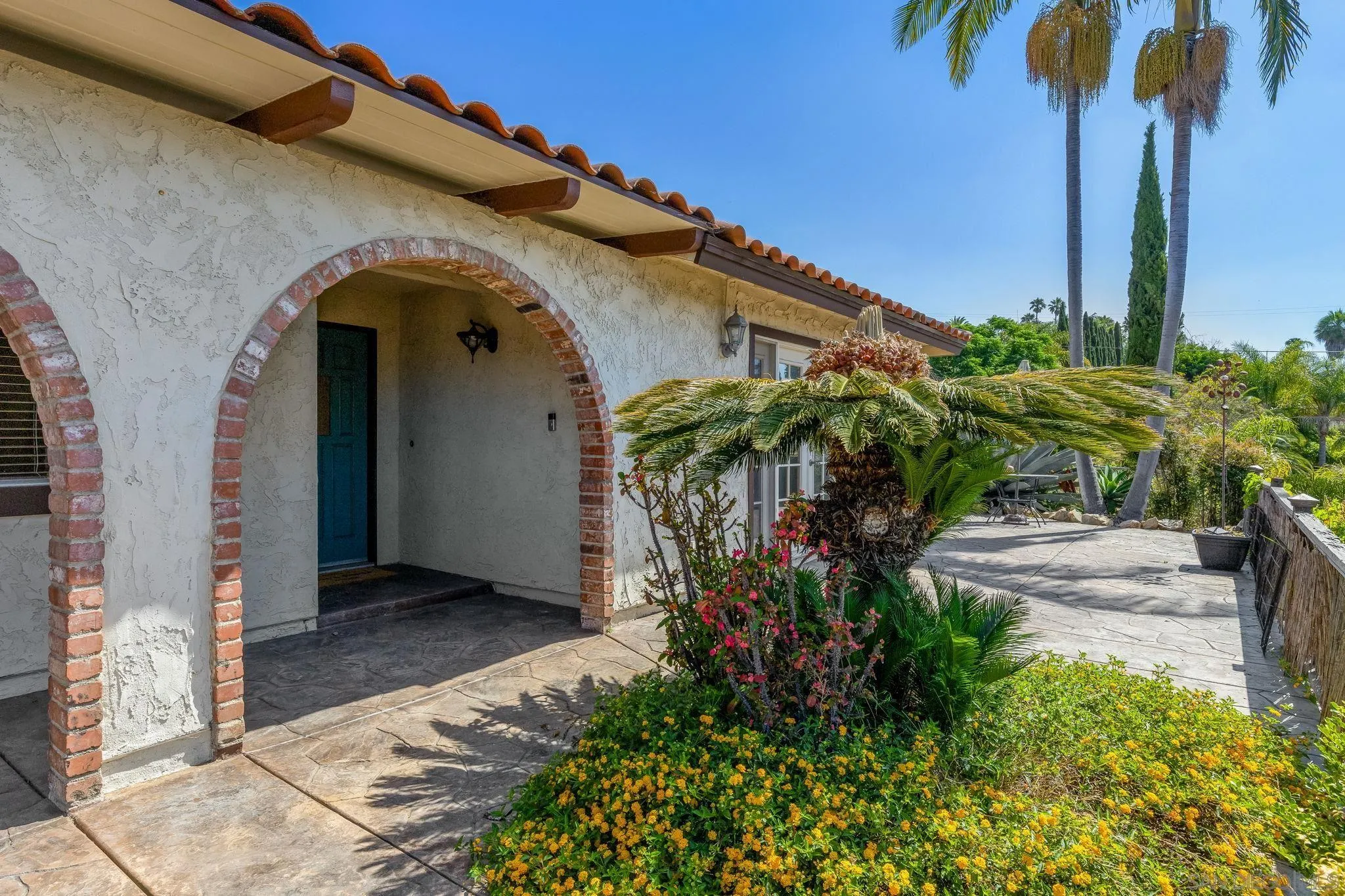 244 Avalon Drive Vista, CA 92084 - Photo 2 of 23 a front view of a house with a yard