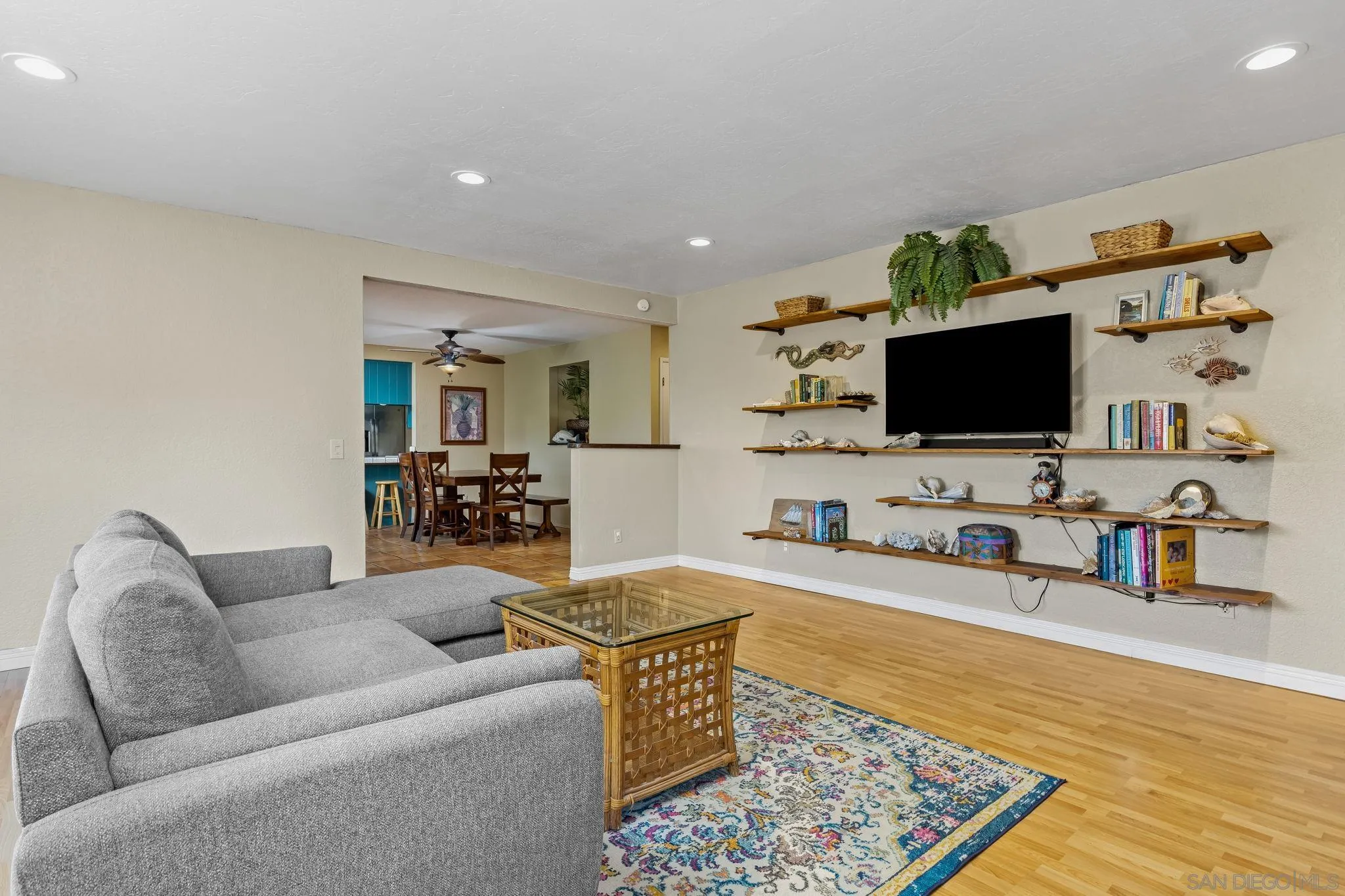 244 Avalon Drive Vista, CA 92084 - Photo 3 of 23 a living room with furniture and a flat screen tv