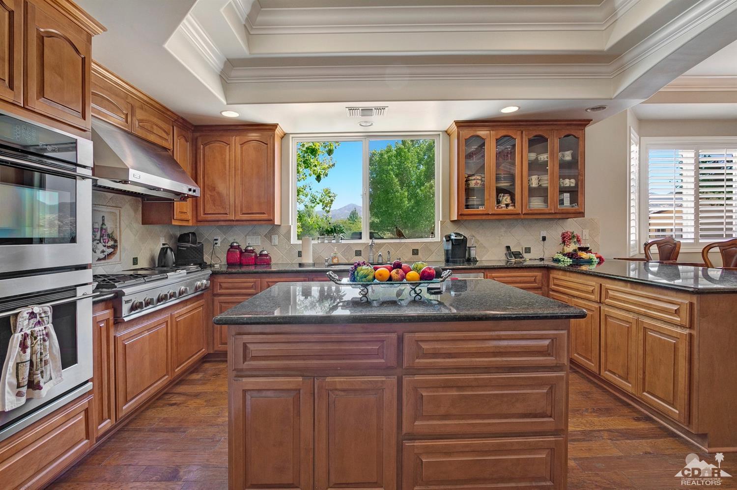 60266 Hop Patch Spring Road Mountain Center, CA 92561 - Photo 14 of 41 a kitchen with sink cabinets and window