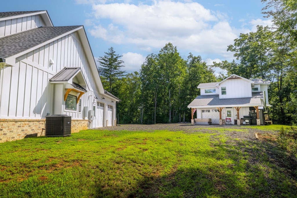 60 Buckeye Branch Road Morganton, GA 30560 - Photo 14 of 54 a view of house with garden and trees