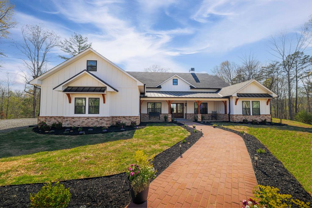 60 Buckeye Branch Road Morganton, GA 30560 - Photo 2 of 54 a front view of a house with garden