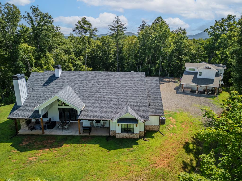 60 Buckeye Branch Road Morganton, GA 30560 - Photo 10 of 54 an aerial view of a house with swimming pool and a yard