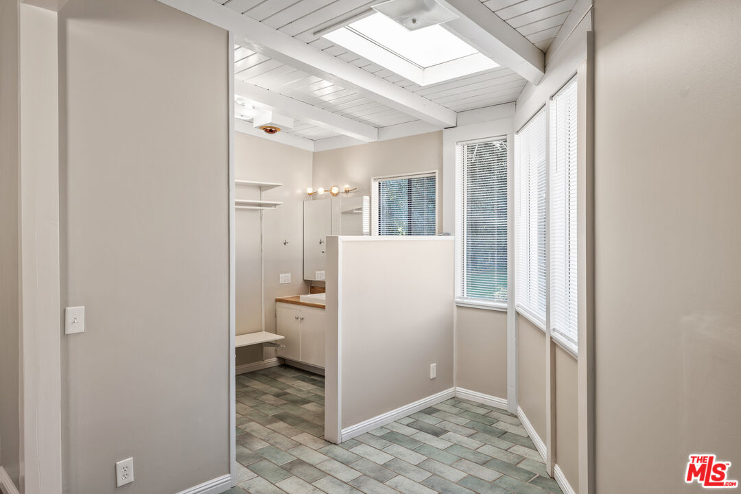 6327 Ranchito Avenue Valley Glen, CA 91401 - Photo 30 of 46 a bathroom with a sink and a toilet