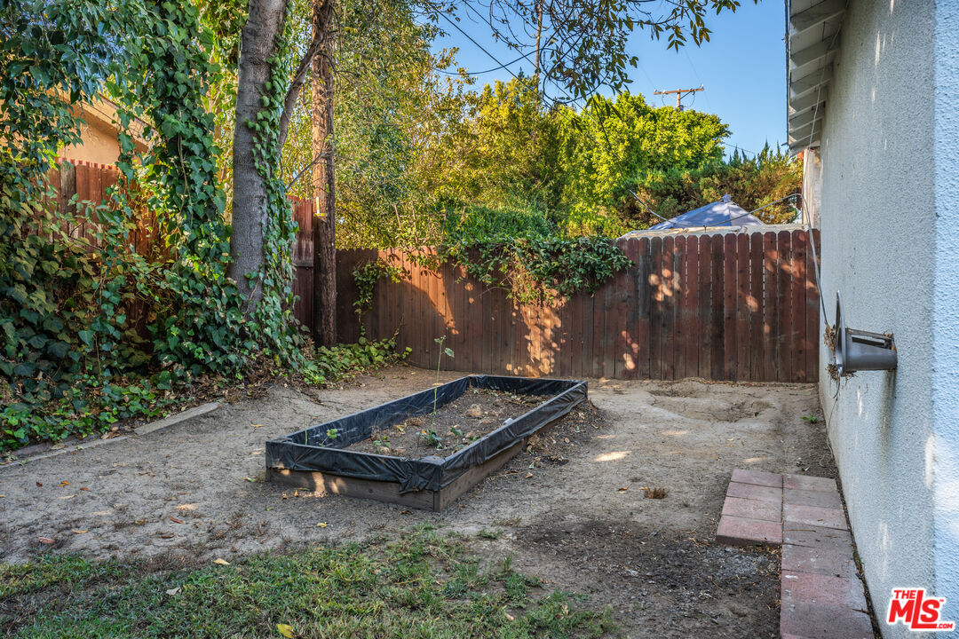 6327 Ranchito Avenue Valley Glen, CA 91401 - Photo 36 of 46 a backyard view with a seating space