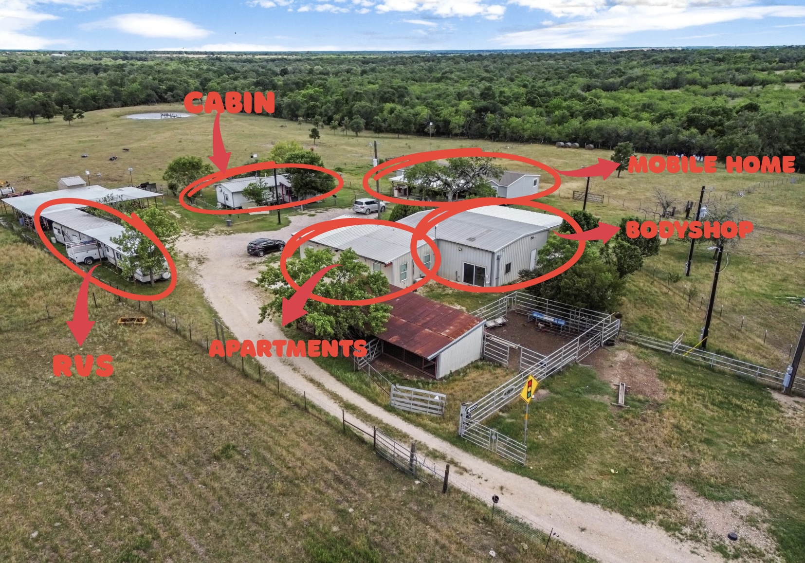 480 Grandpa Road Lockhart, TX 78644 - Photo 35 of 35 Drone / aerial view of a heavily wooded area