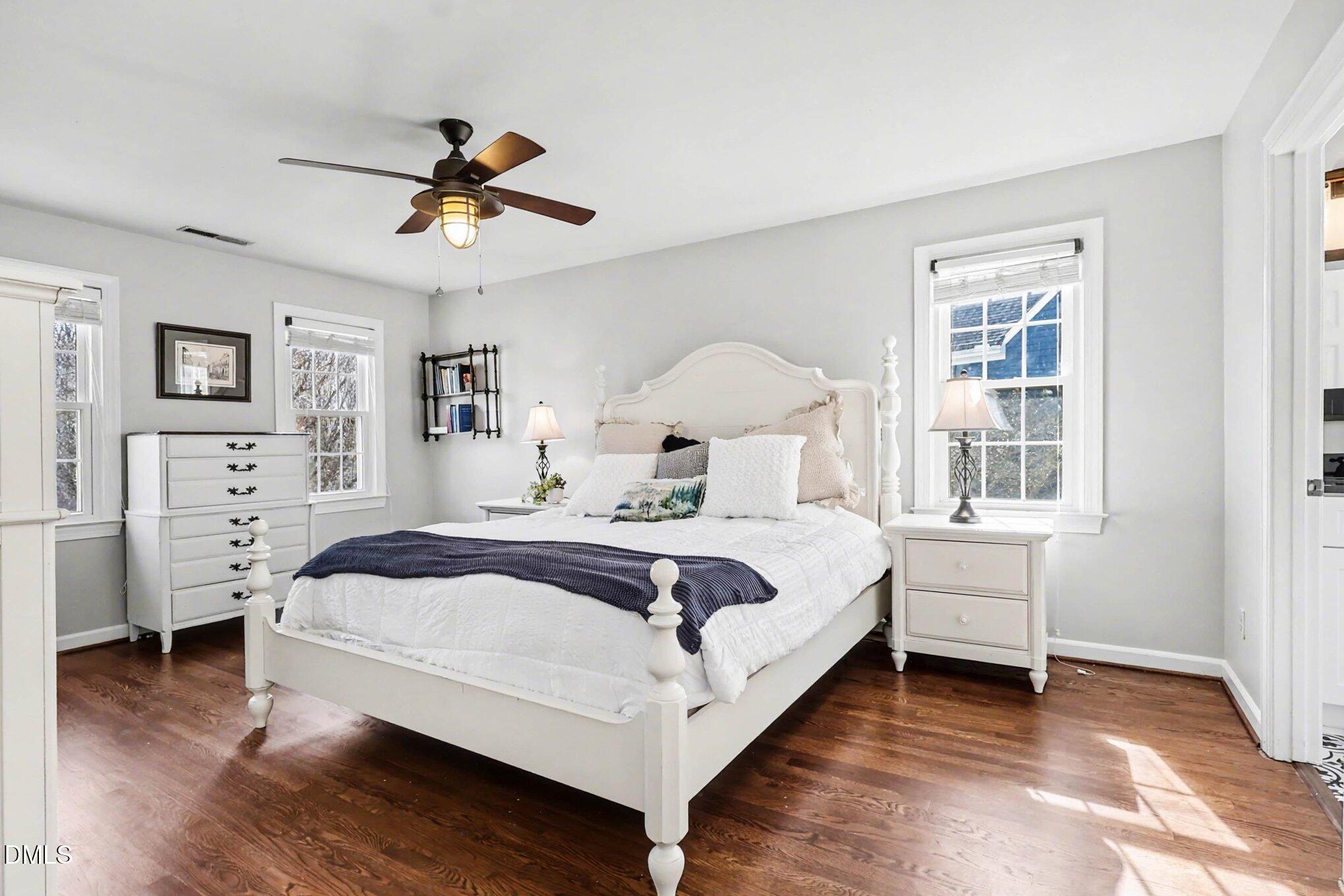119 Felspar Way Cary, NC 27518 - Photo 17 of 53 a bedroom with a bed and a window