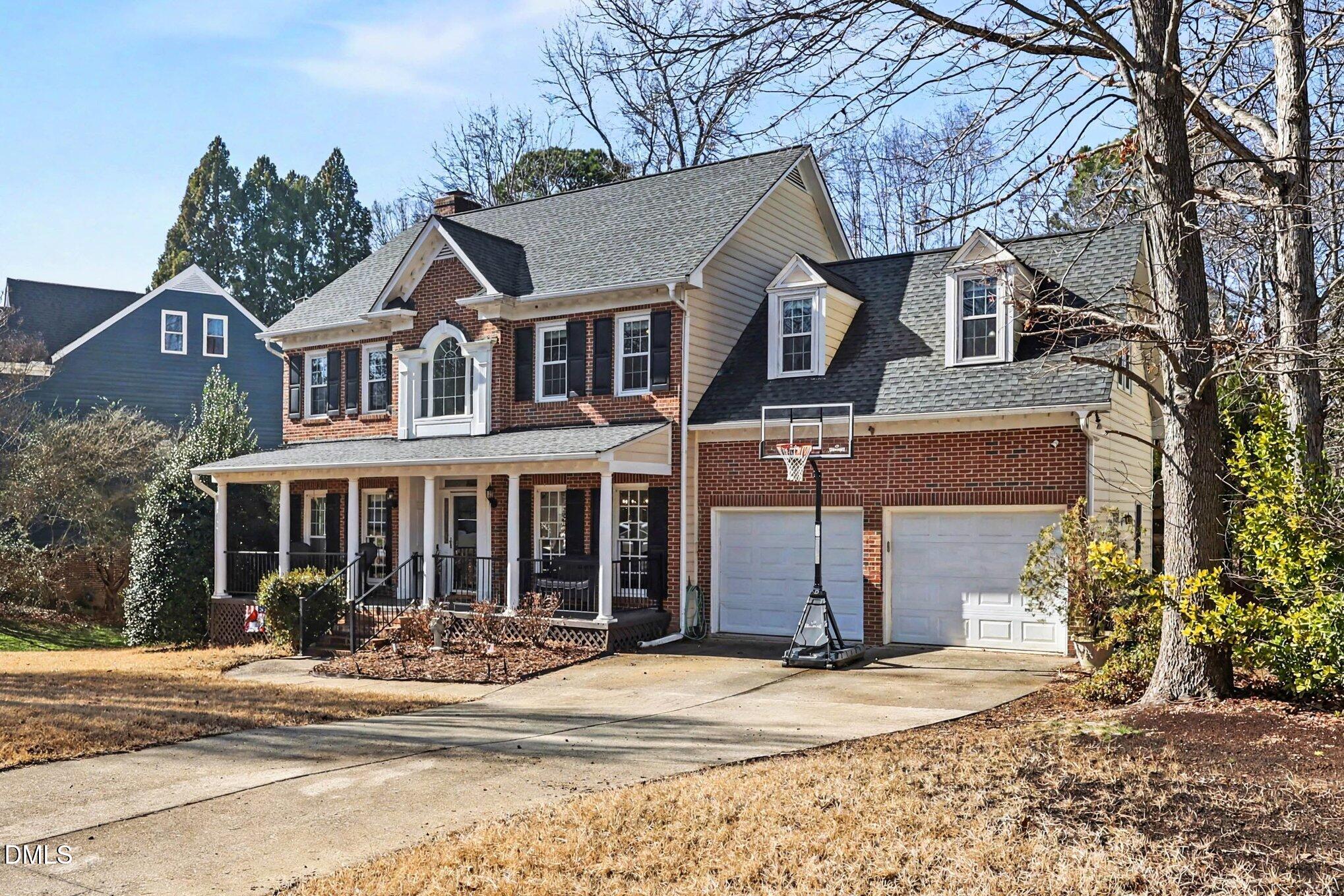 119 Felspar Way Cary, NC 27518 - Photo 2 of 53 a front view of a house with a yard
