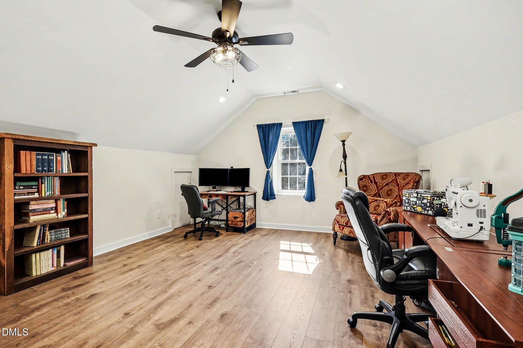 119 Felspar Way Cary, NC 27518 - Photo 31 of 53 a view of a workspace with furniture and wooden floor