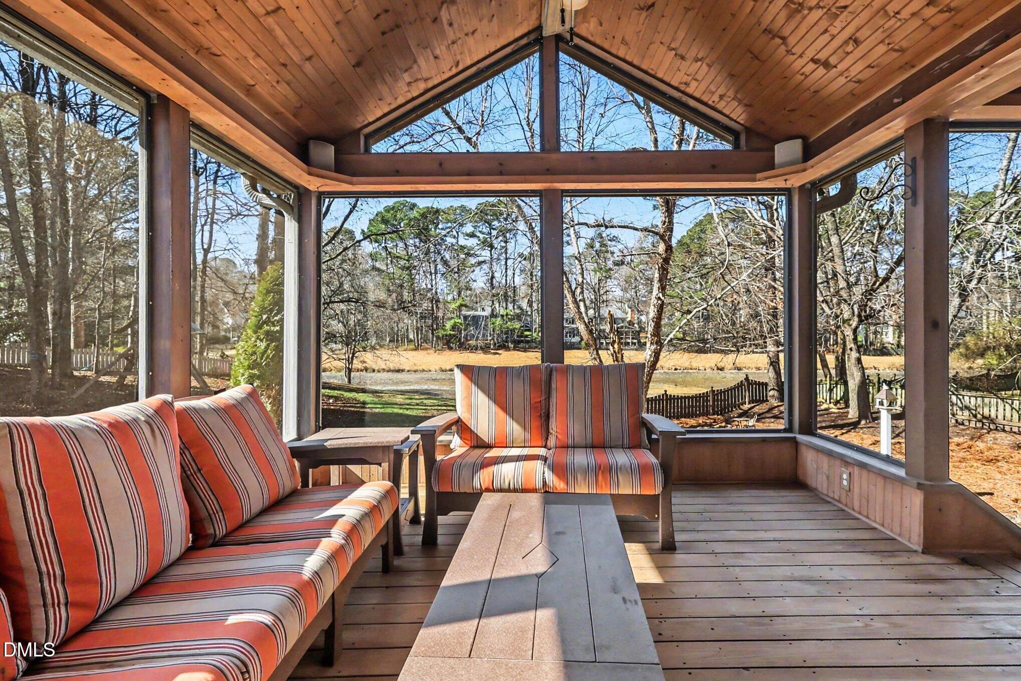 119 Felspar Way Cary, NC 27518 - Photo 32 of 53 a living room with large windows and furniture