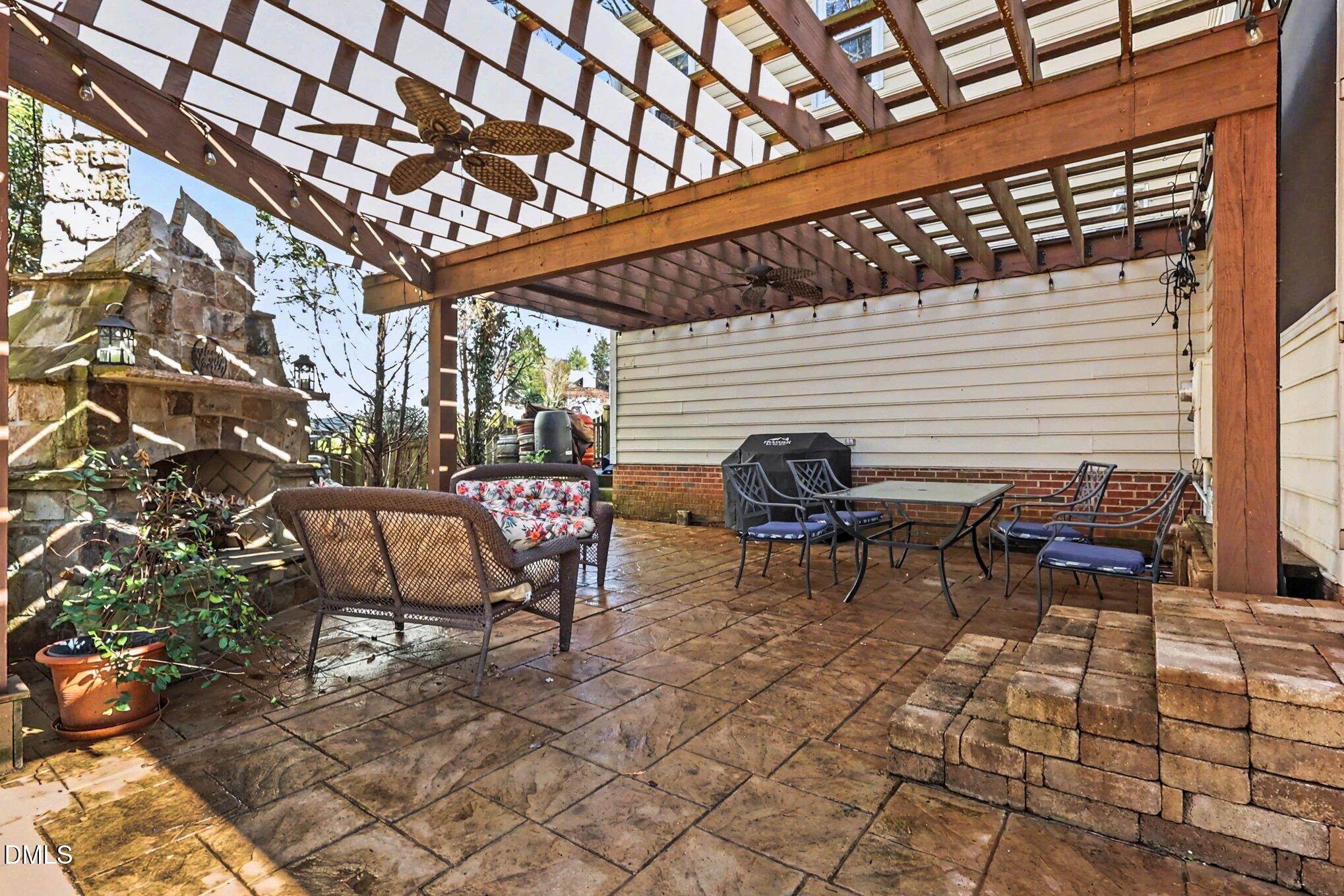 119 Felspar Way Cary, NC 27518 - Photo 38 of 53 a backyard of a house with outdoor seating