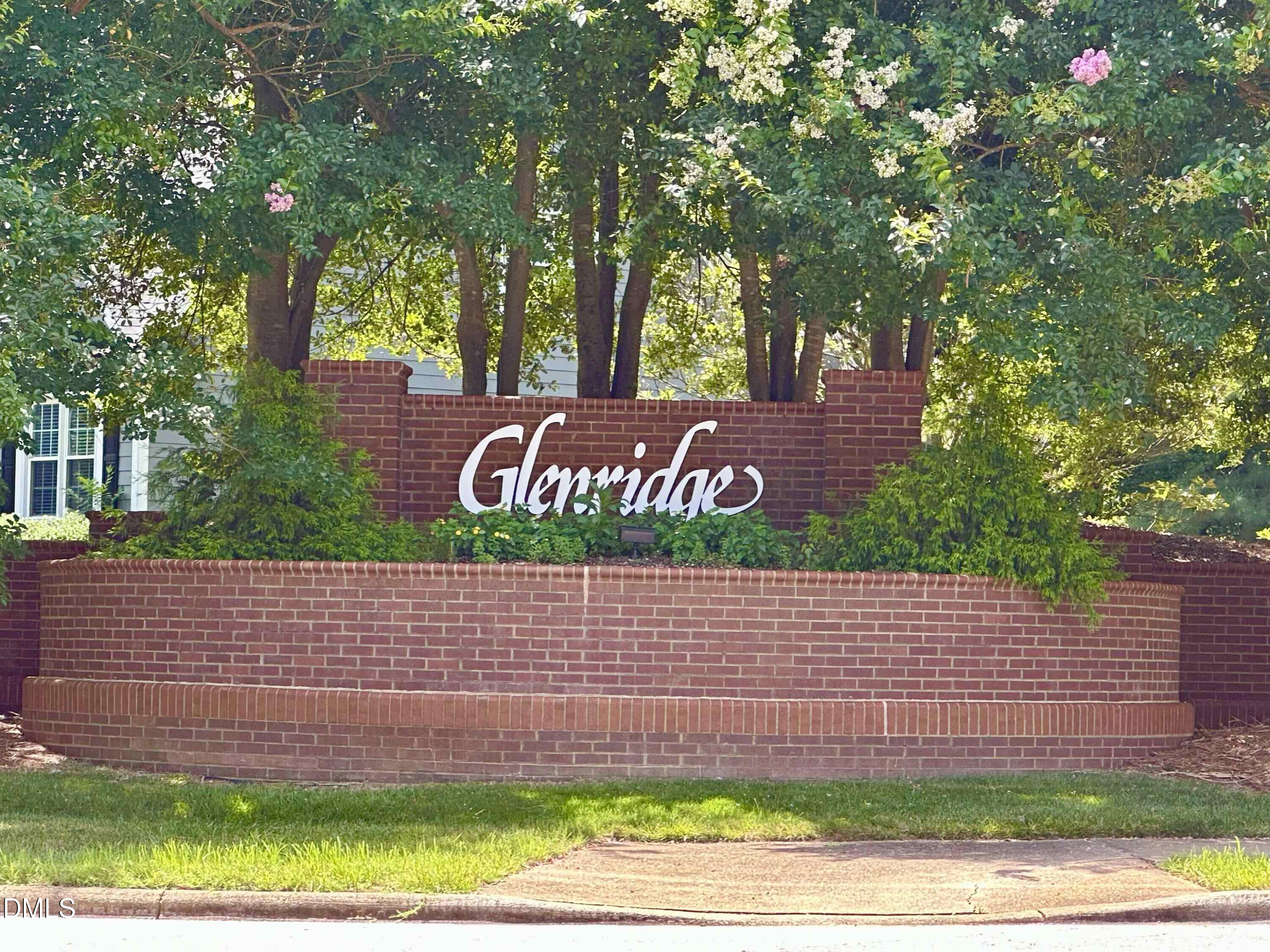 119 Felspar Way Cary, NC 27518 - Photo 49 of 53 a sign that is on the side of the tree