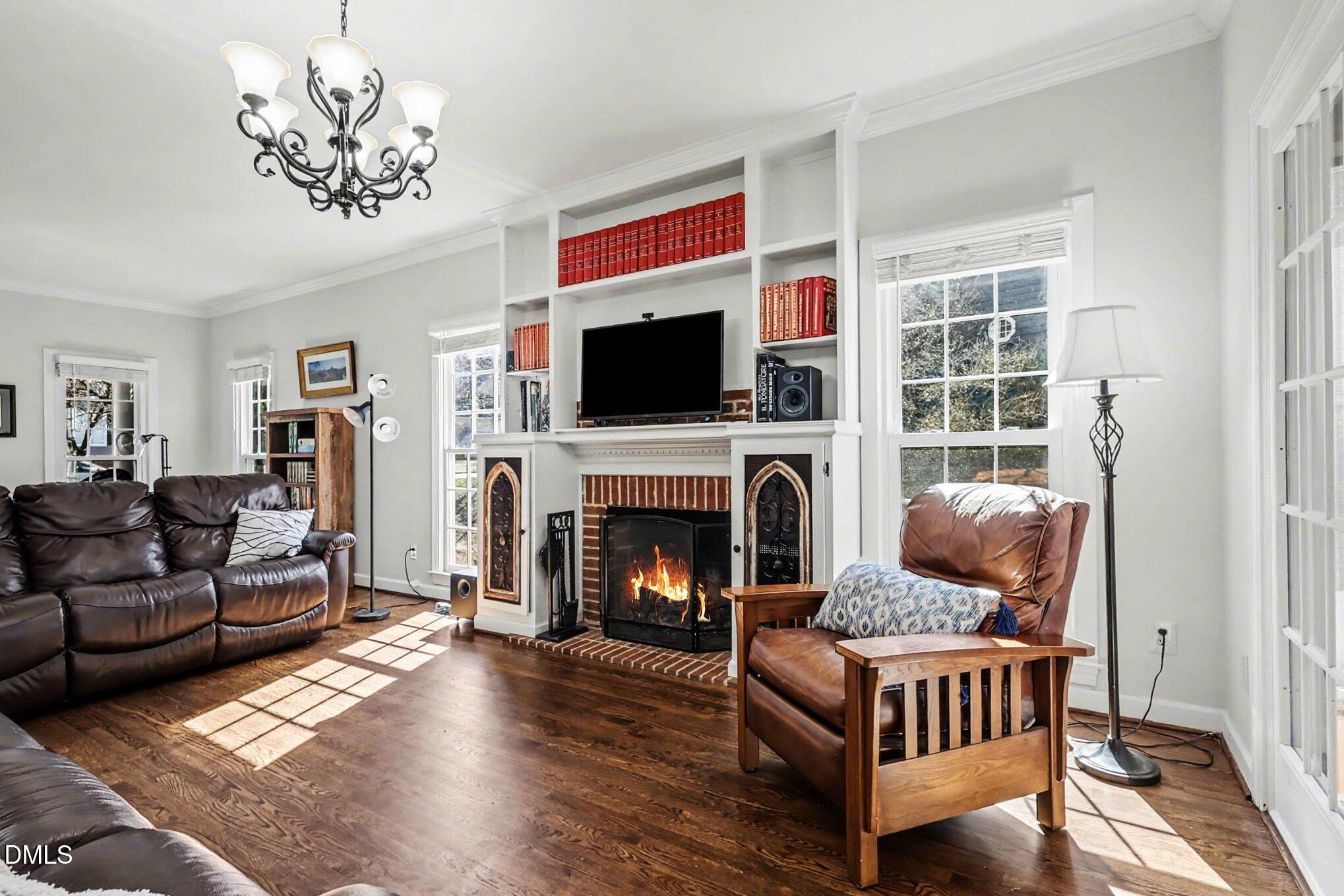 119 Felspar Way Cary, NC 27518 - Photo 8 of 53 a living room with furniture and a fireplace