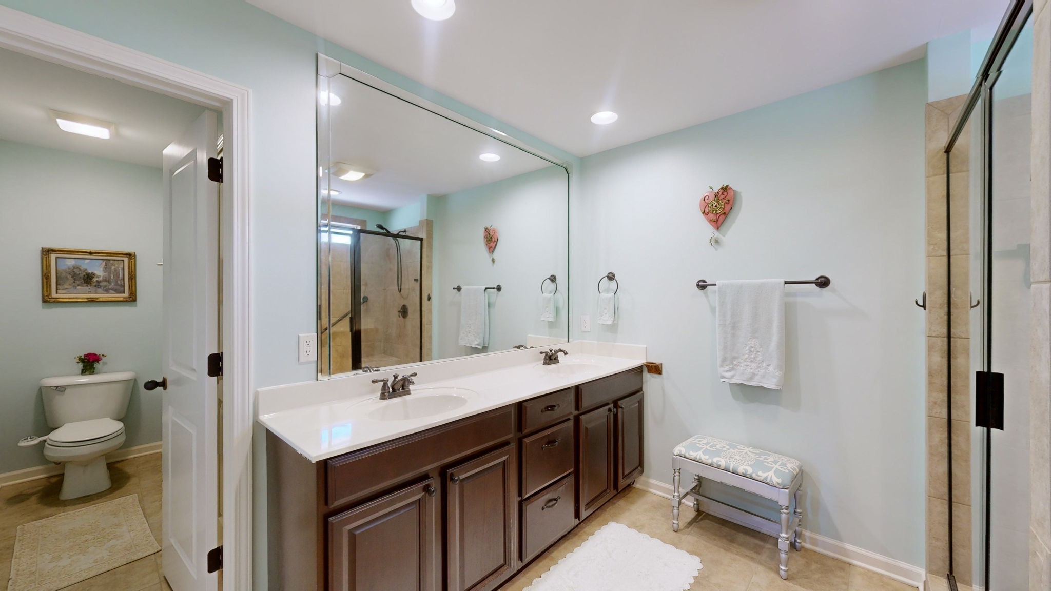 3924 Rowland Road Murfreesboro, TN 37128 - Photo 23 of 53 a bathroom with a double vanity sink toilet and shower