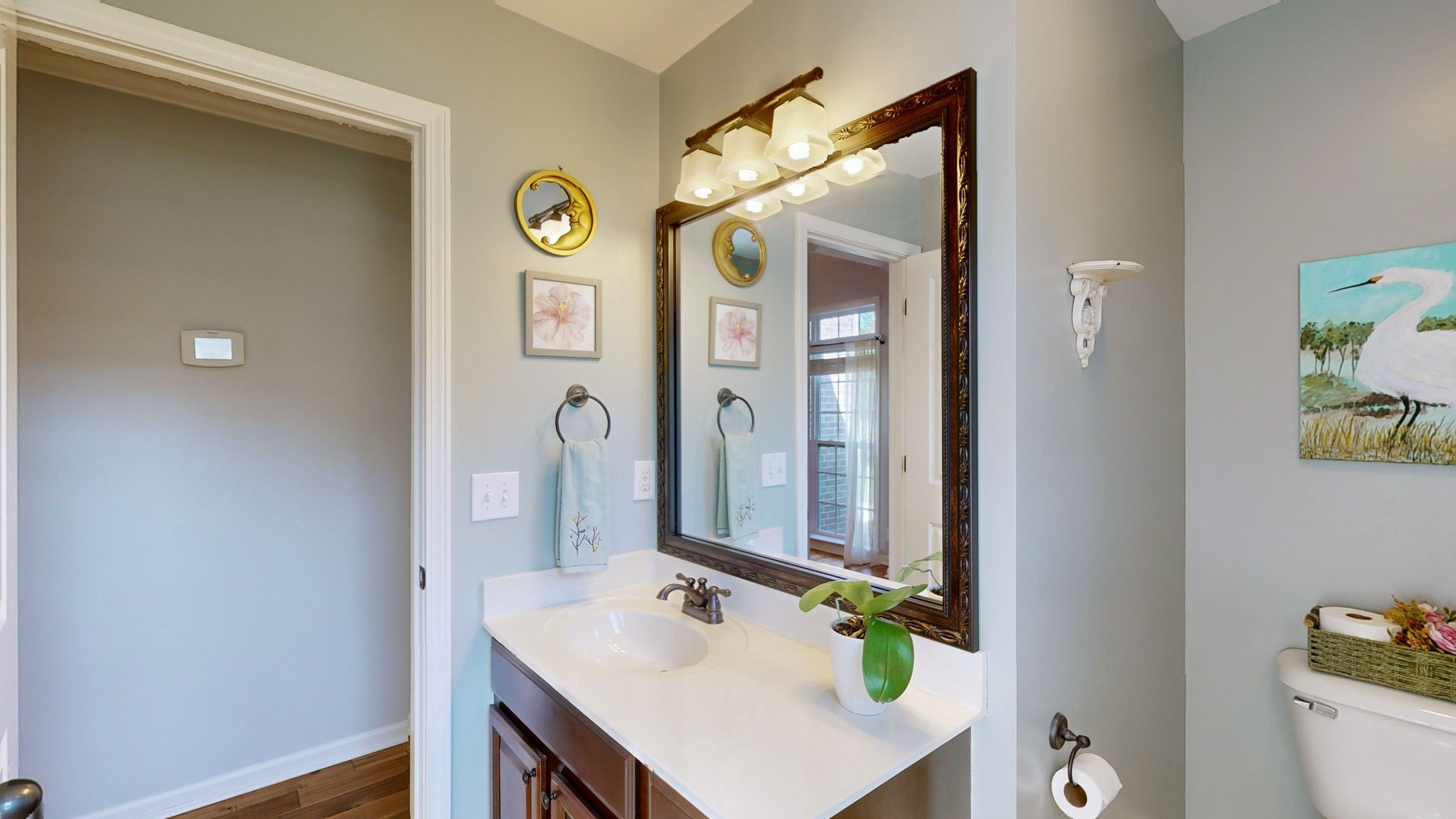 3924 Rowland Road Murfreesboro, TN 37128 - Photo 29 of 53 a bathroom with a sink vanity and a mirror