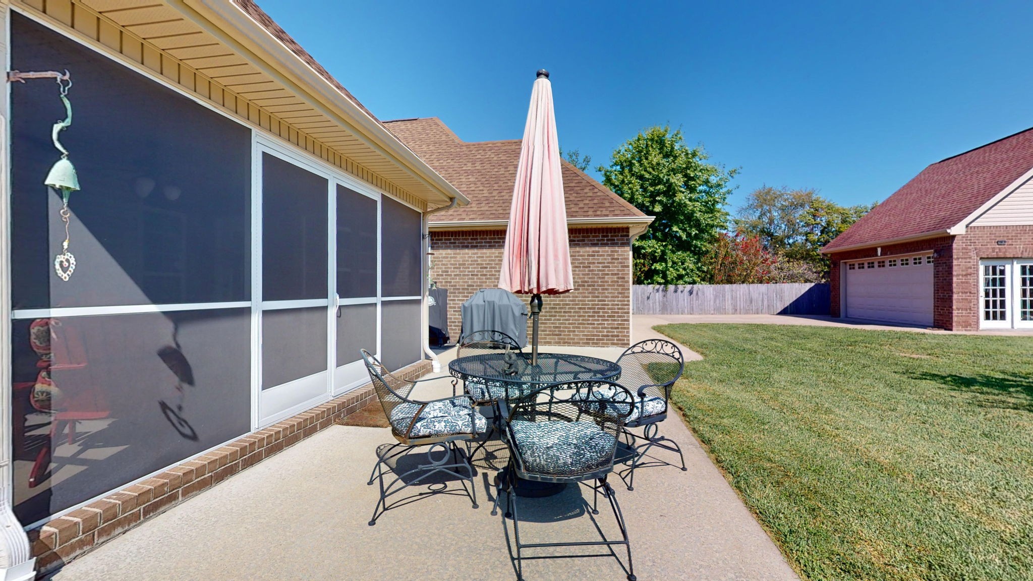 3924 Rowland Road Murfreesboro, TN 37128 - Photo 36 of 53 a backyard of a house with table and chairs