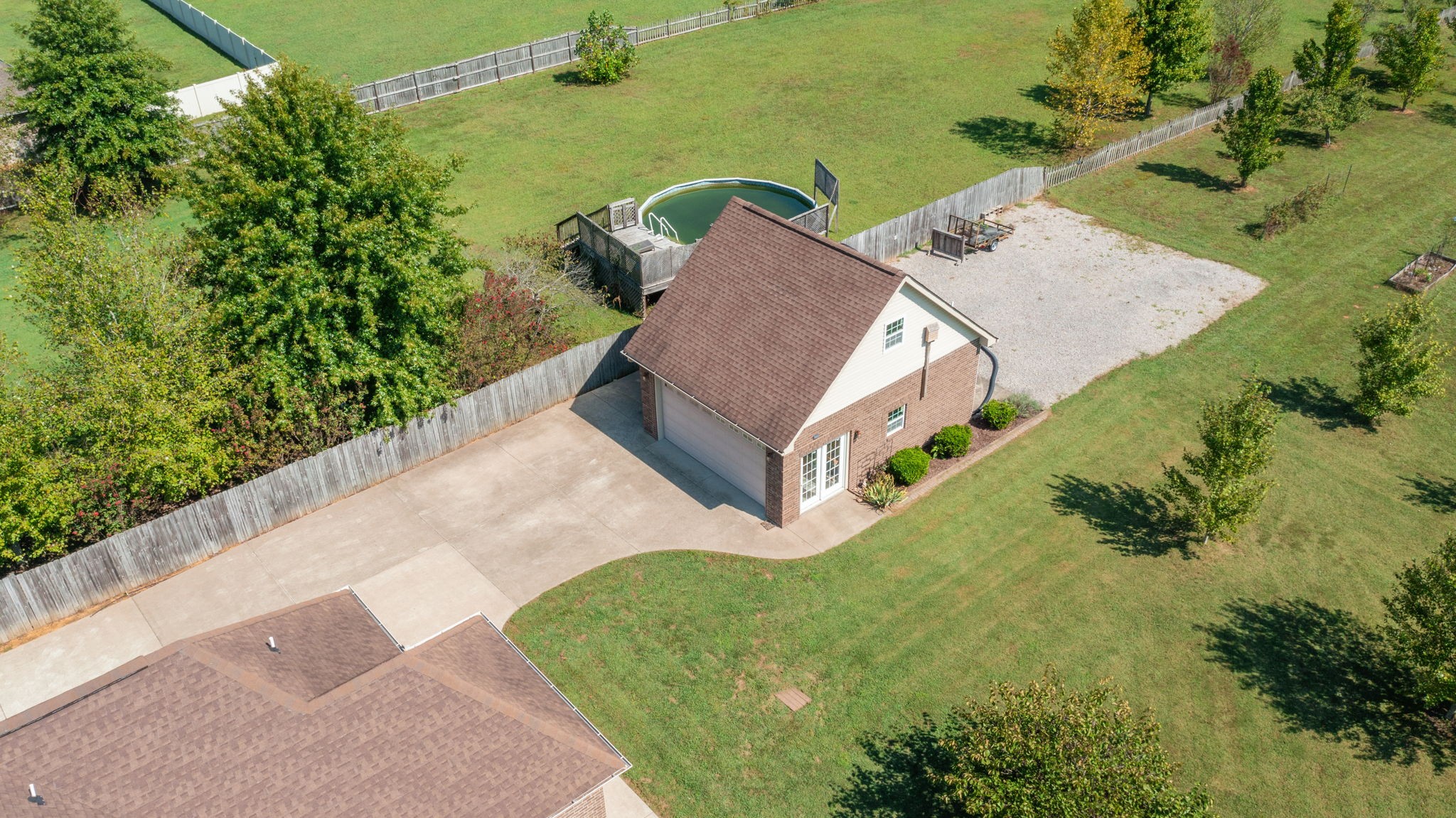 3924 Rowland Road Murfreesboro, TN 37128 - Photo 39 of 53 an aerial view of a house with a yard and lake view