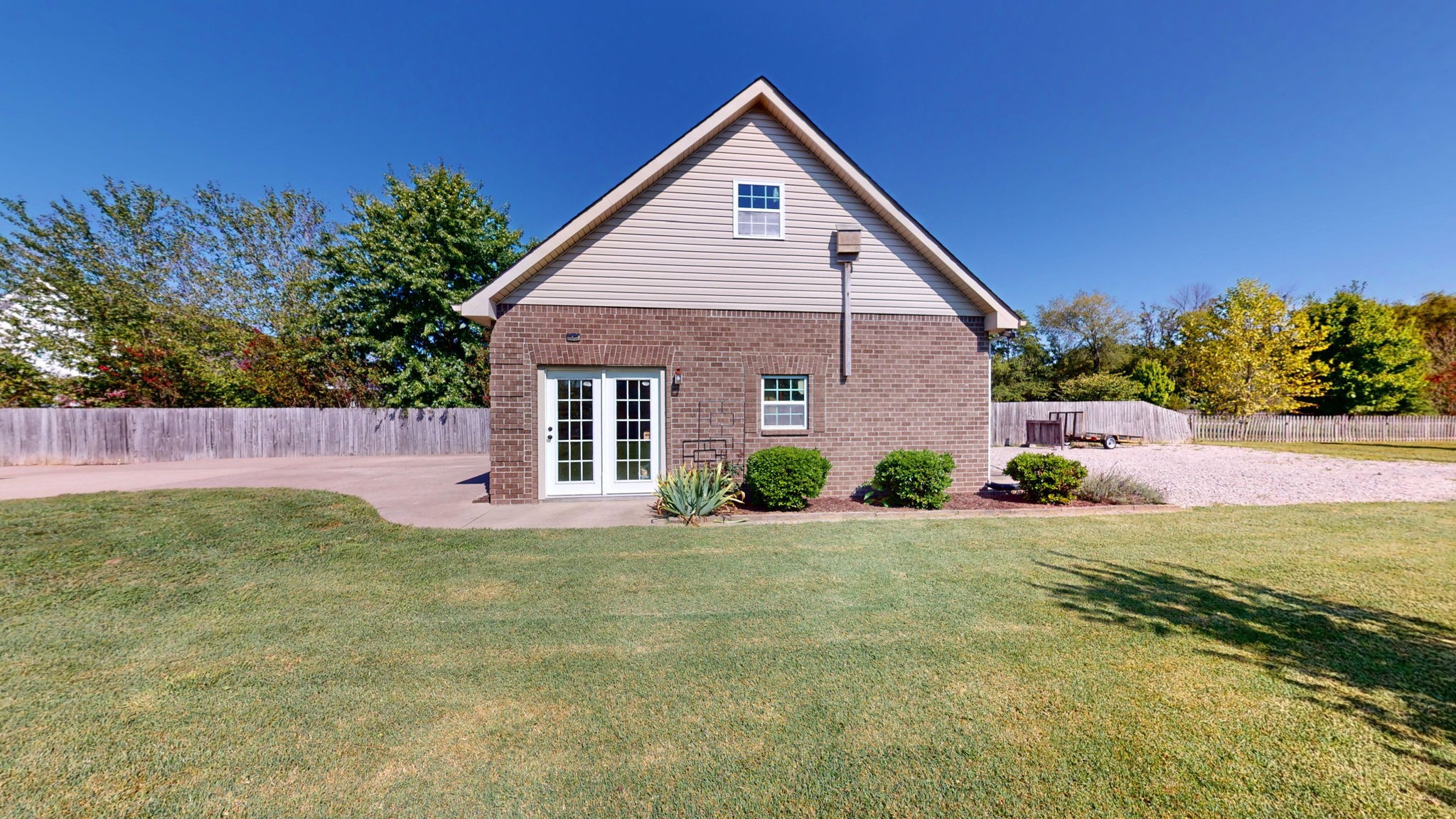 3924 Rowland Road Murfreesboro, TN 37128 - Photo 40 of 53 a front view of a house with a yard and garage