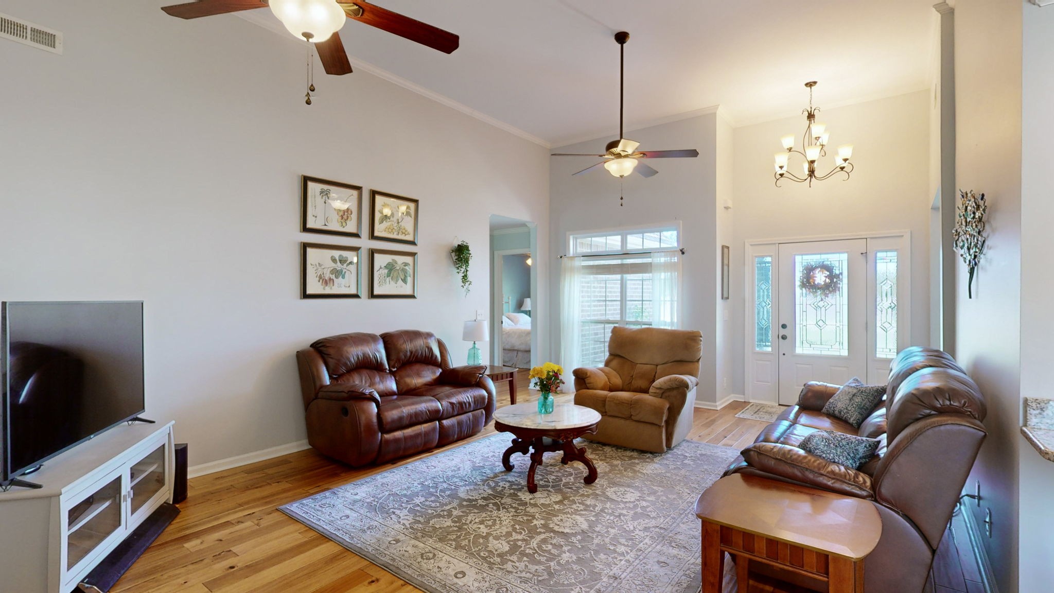 3924 Rowland Road Murfreesboro, TN 37128 - Photo 4 of 53 a living room with furniture a ceiling fan and a rug