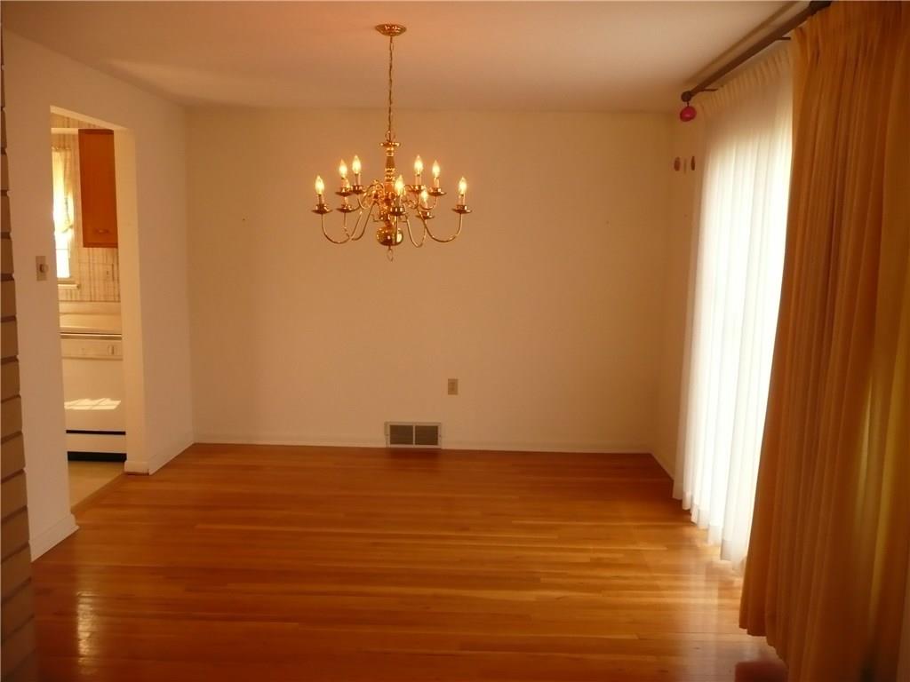 234 Lytton Road Coraopolis, PA 15108 - Photo 5 of 20 FORMAL DINING ROOM WITH HARDWOOD FLOORS AND SLIDER TO SIDE PATIO