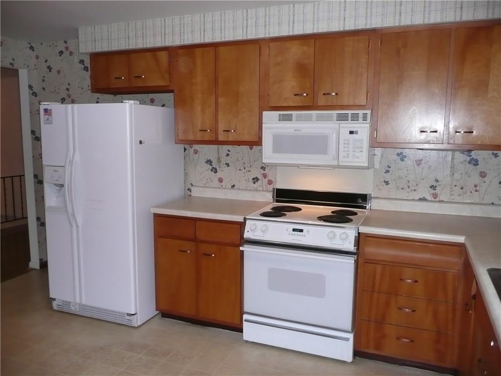 234 Lytton Road Coraopolis, PA 15108 - Photo 8 of 20 AMPLE CABINET SPACE IN KITCHEN