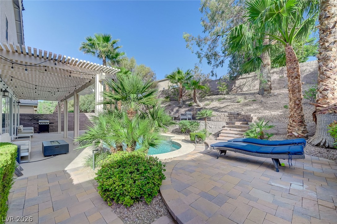 2391 Rainswept Avenue Henderson, NV 89052 - Photo 14 of 62 This private outdoor retreat features a tranquil pool and spacious patio.