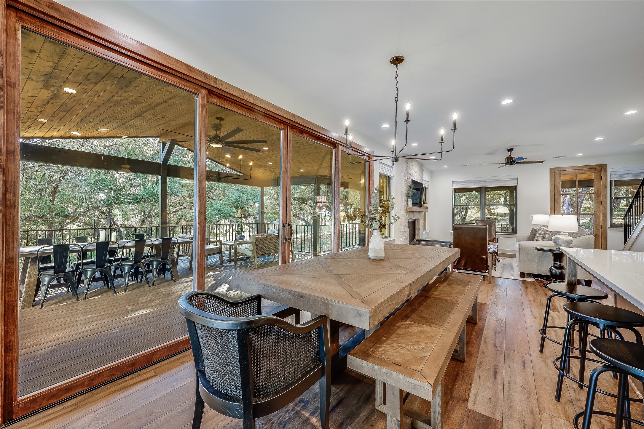 7601 Bar K Ranch Road Lago Vista, TX 78645 - Photo 3 of 38 Dining Room opens to spacious covered outdoor deck!
