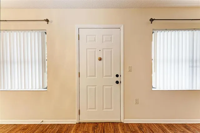 a view of a room that has a window in it