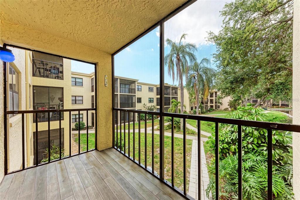 305 30th Avenue West, Unit A210 Bradenton, FL 34205 - Photo 27 of 33 a view of a balcony with city view