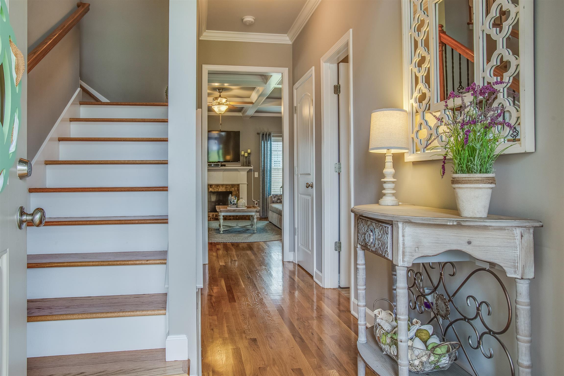 You will be impressed by the quality of this John Maher home the minute you step onto the sand and finished wood floors.  Upgraded wood stairs and iron rails add to the elegance.