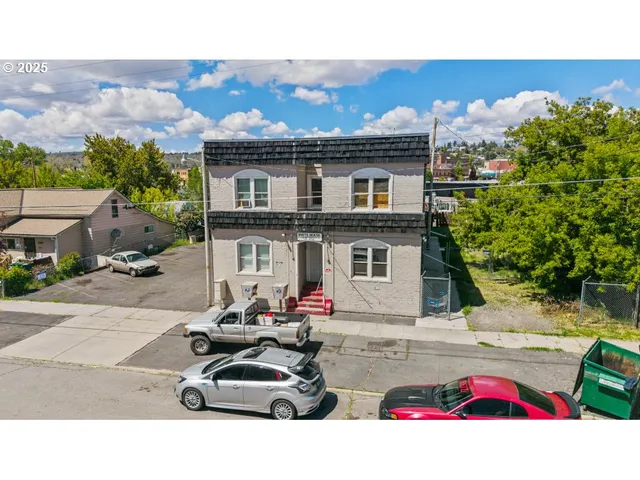 a car parked in front of a house