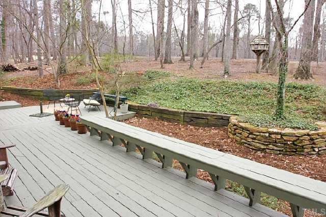 113 Queensferry Road Cary, NC 27511 - Photo 7 of 9 a view of a wooden deck with a yard