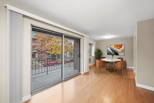 a view of a living room and dining room