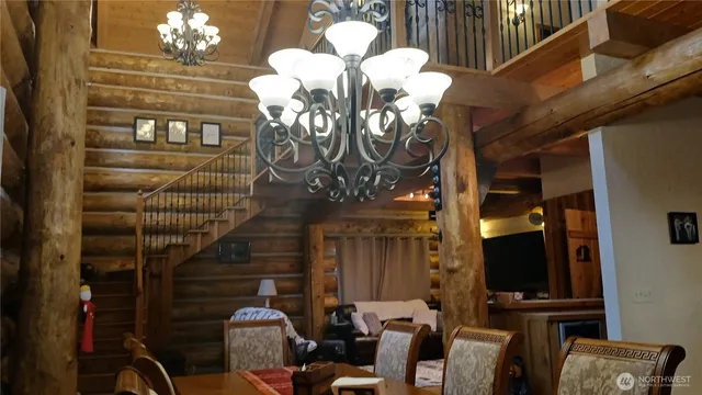 a vase of flowers sitting on a table in a room