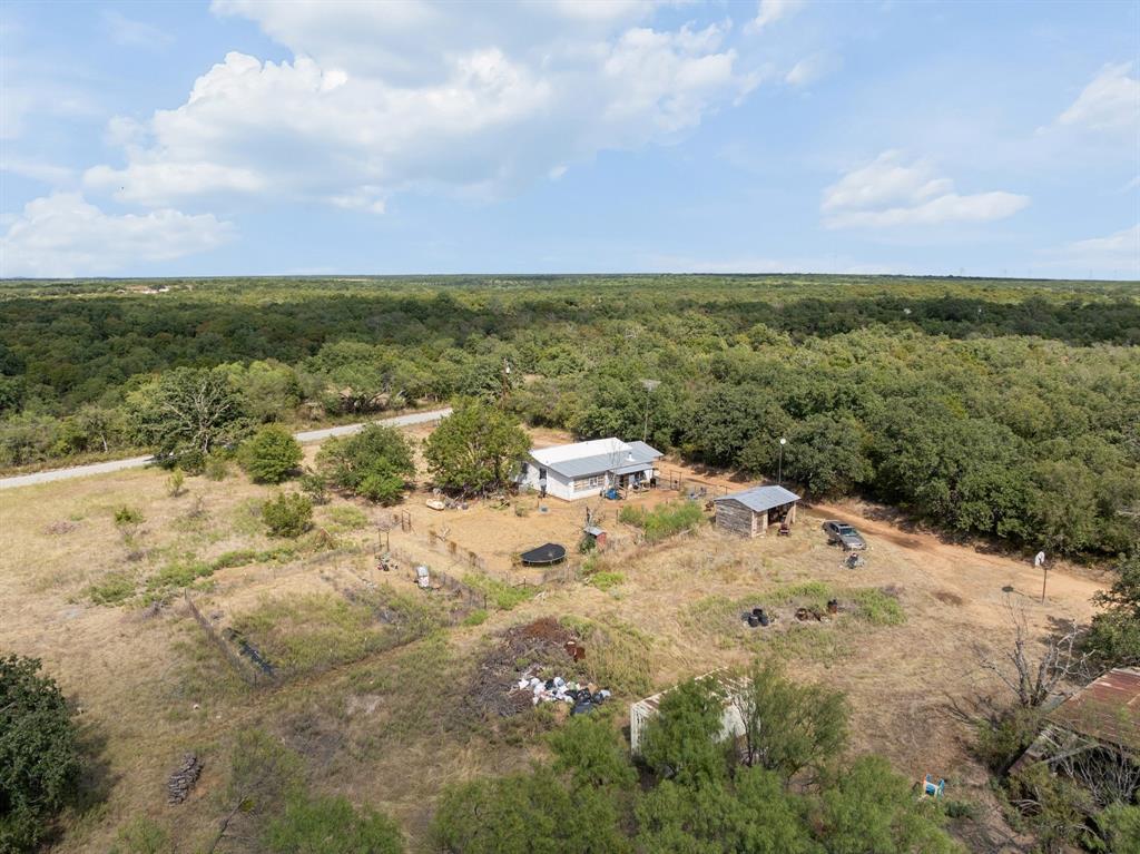 11097 County Road 137 Ranger, TX 76470 - Photo 39 of 40 Single-story residence with a metal roof and an attached covered porch