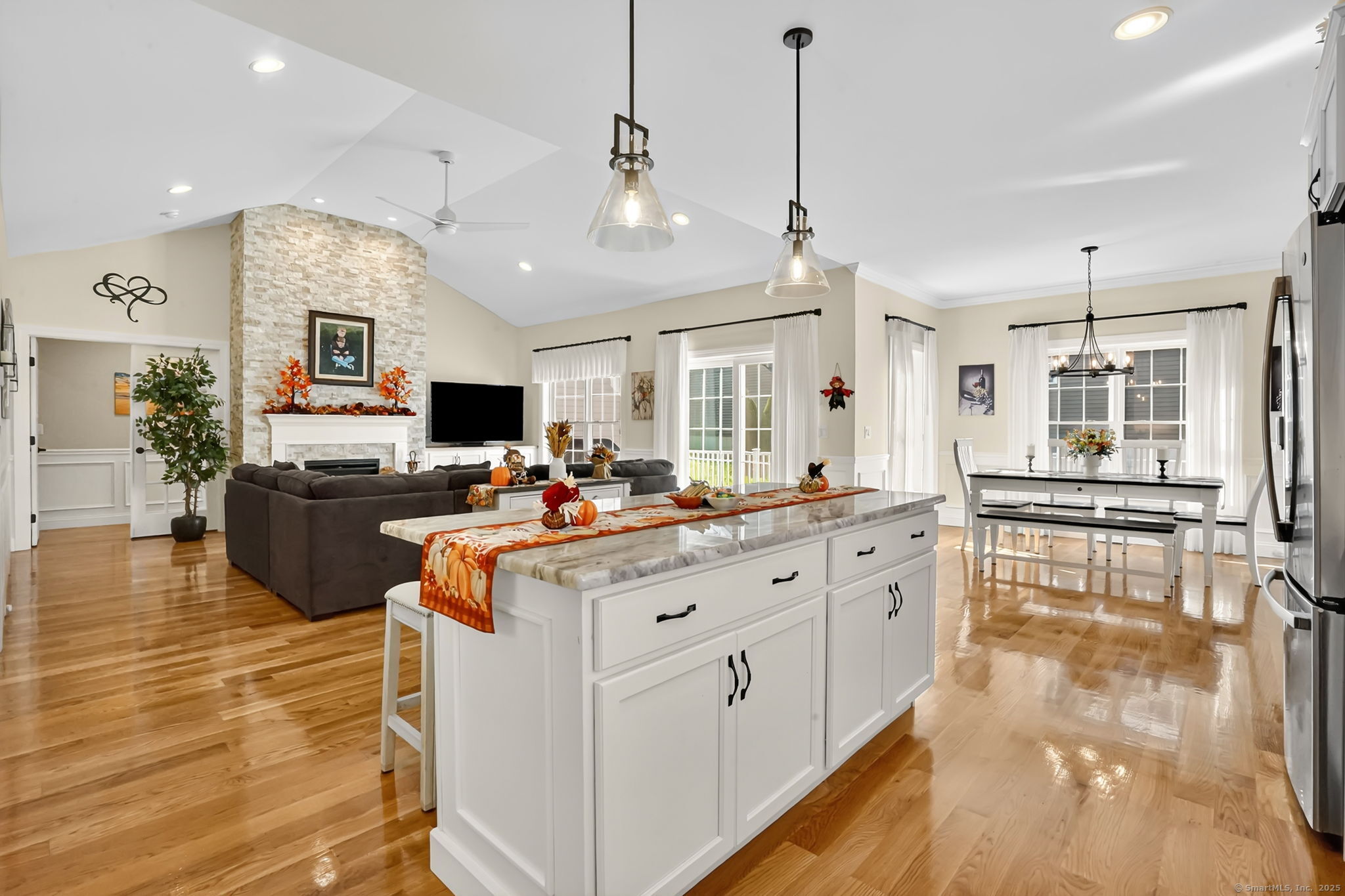 43 Liberty Lane Enfield, CT 06082 - Photo 14 of 33 a large white kitchen with lots of counter space dining table and stainless steel appliances