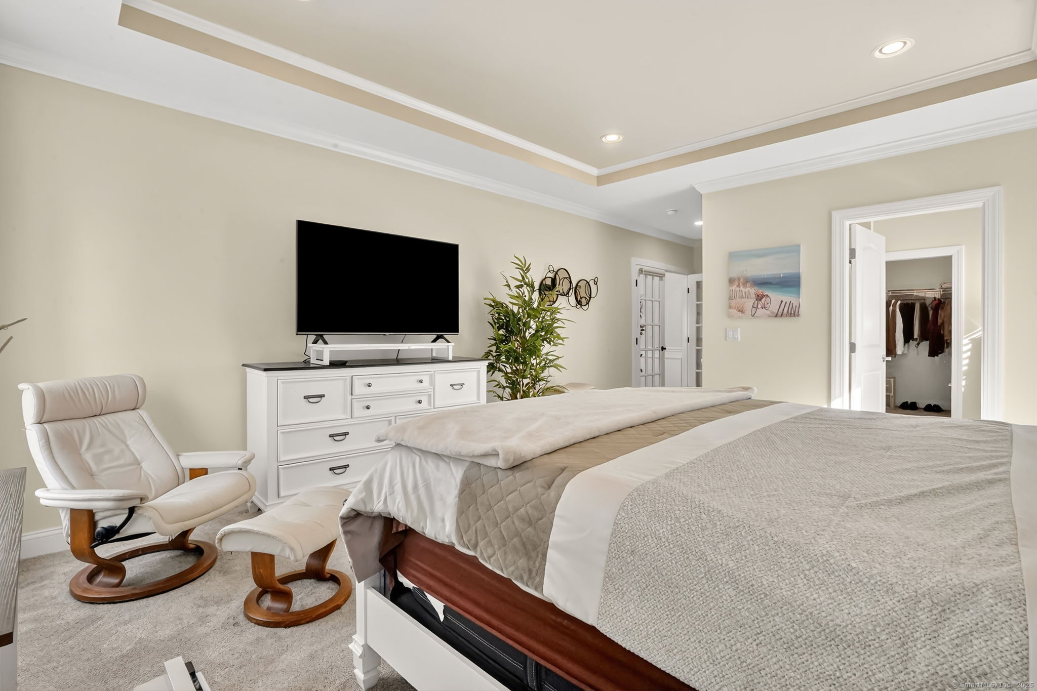 43 Liberty Lane Enfield, CT 06082 - Photo 28 of 33 a bedroom with furniture and a flat screen tv